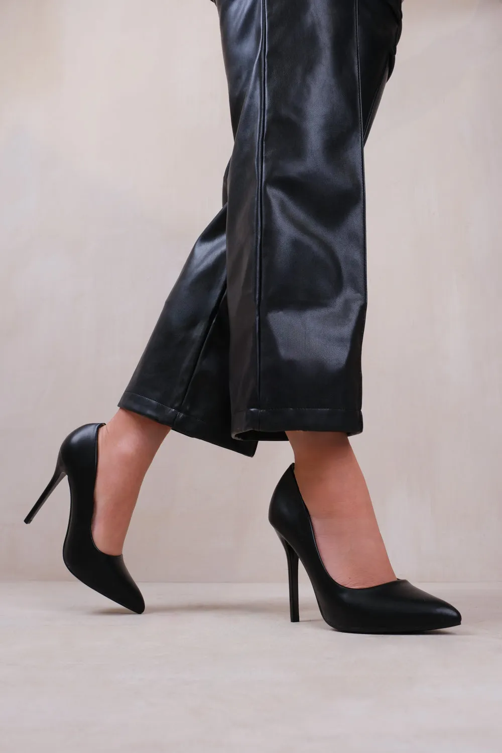 KYRA HIGH HEEL STILETTO PUMPS IN BLACK FAUX LEATHER